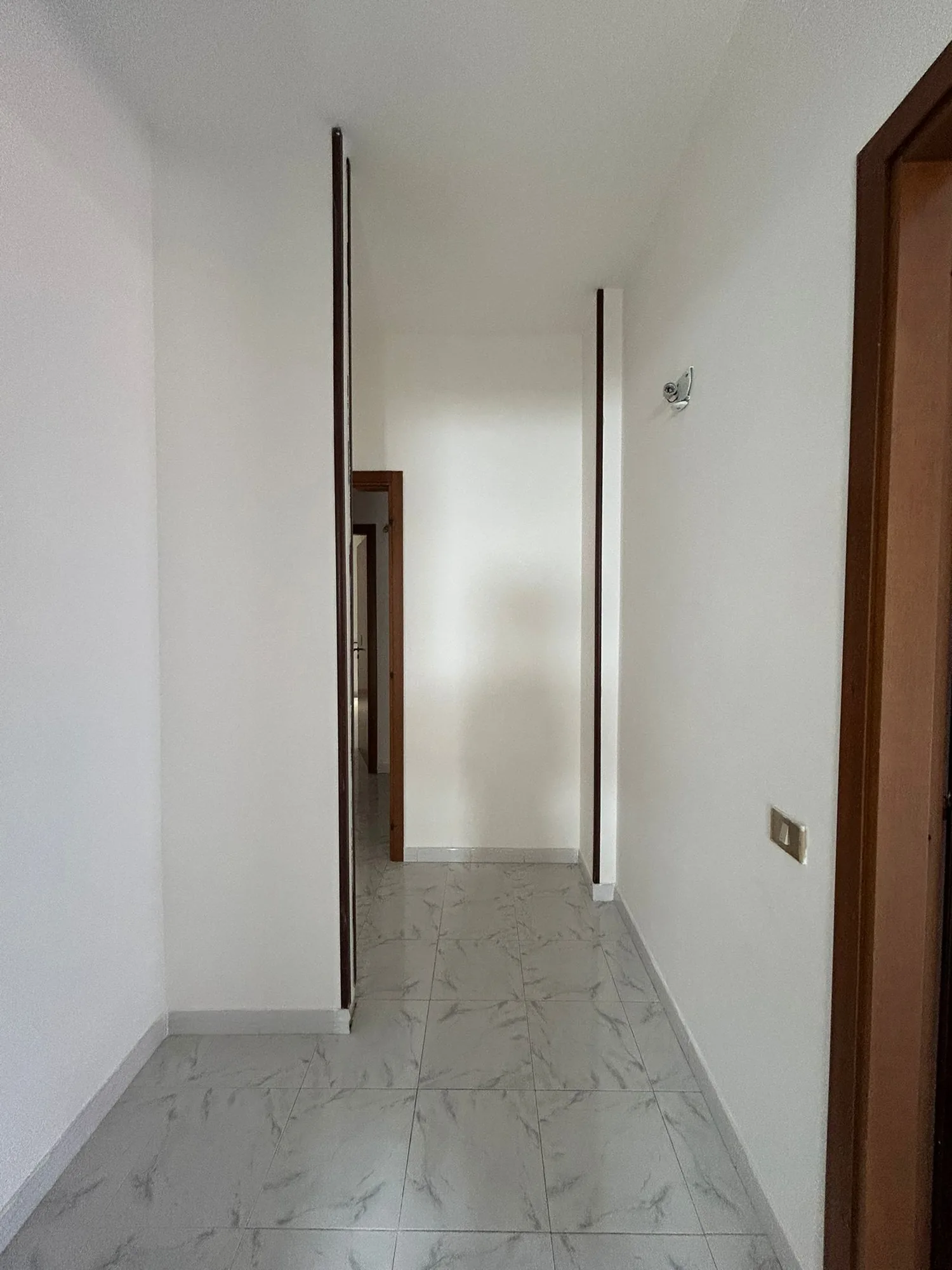 The long corridor of the original distribution, before the reorganization of the plan