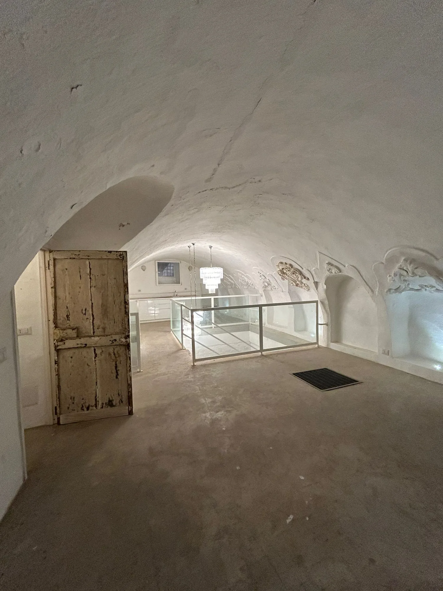 The basement before recovery, with a tuff vault and walls to be cleaned
