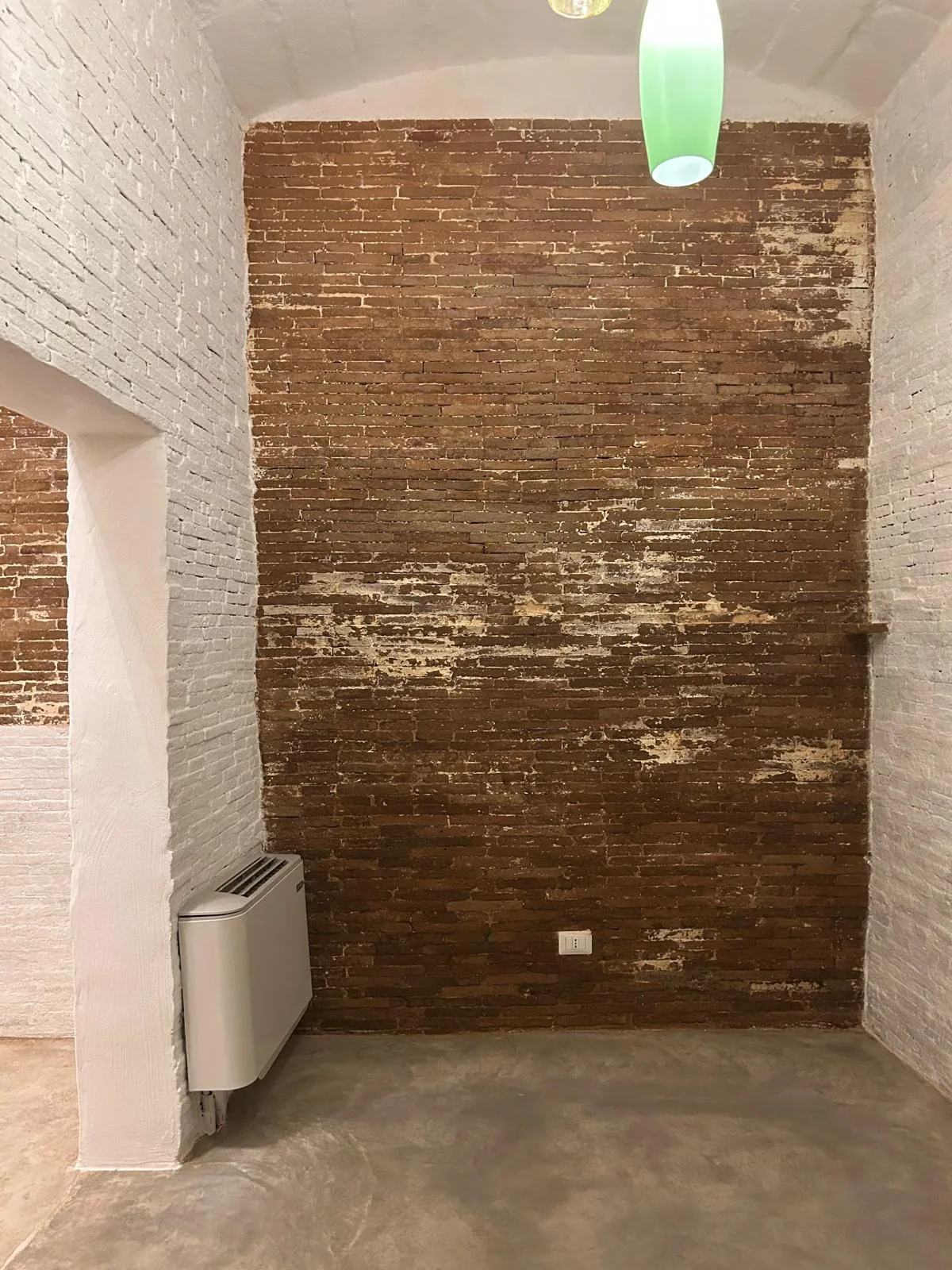 Portion of masonry left exposed before cleaning
